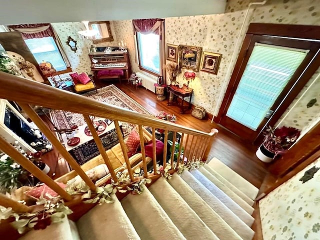 5090 State Route 52, Jeffersonville, NY 12748 - staircase with wallpapered walls and wood finished floors