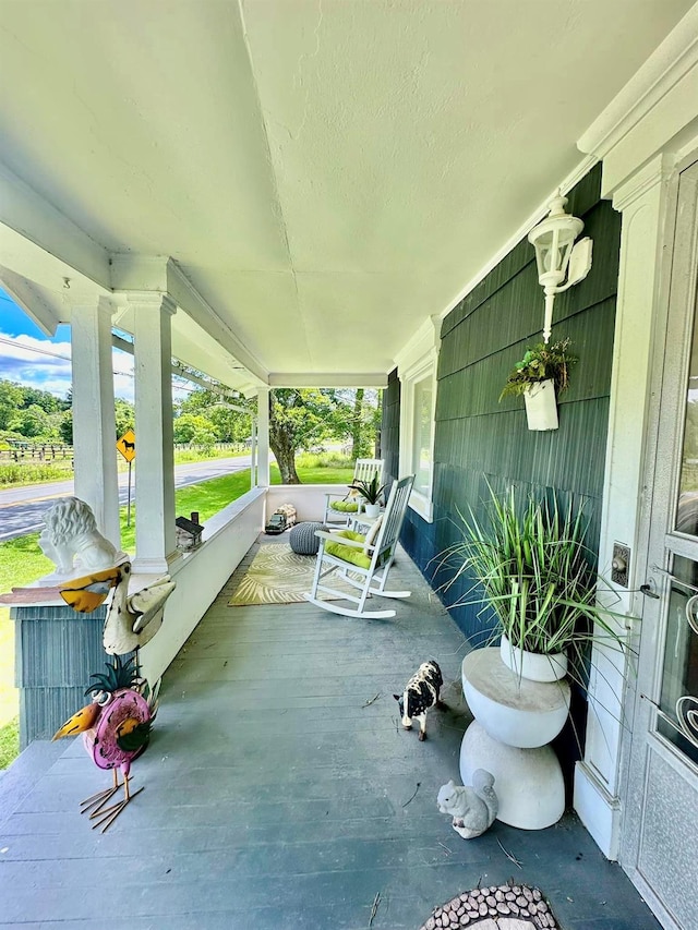 view of patio featuring covered porch