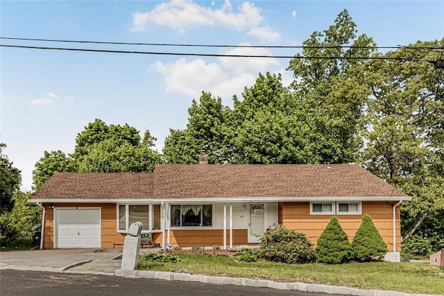 ranch-style home with a garage