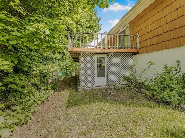 view of yard featuring a wooden deck