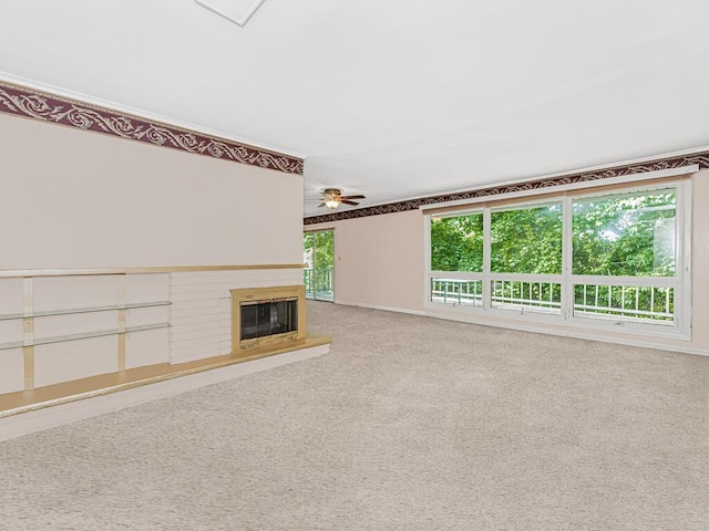 unfurnished living room with carpet flooring and ceiling fan