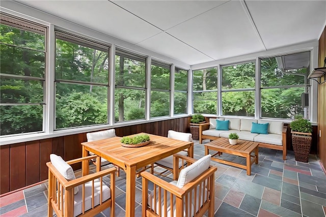 sunroom / solarium featuring plenty of natural light