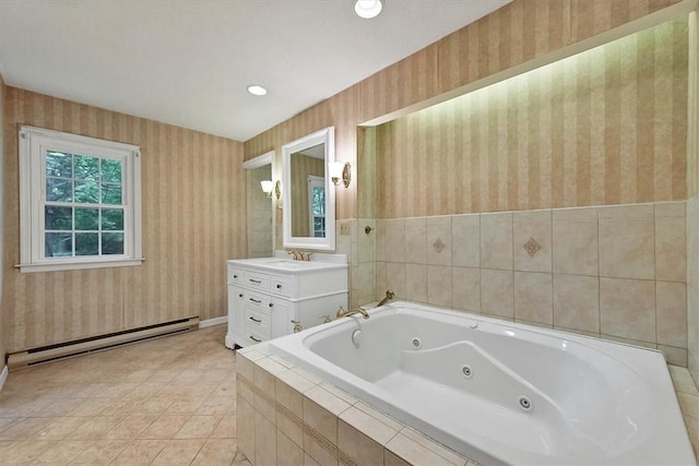 bathroom with tile patterned floors, vanity, a relaxing tiled tub, and a baseboard heating unit