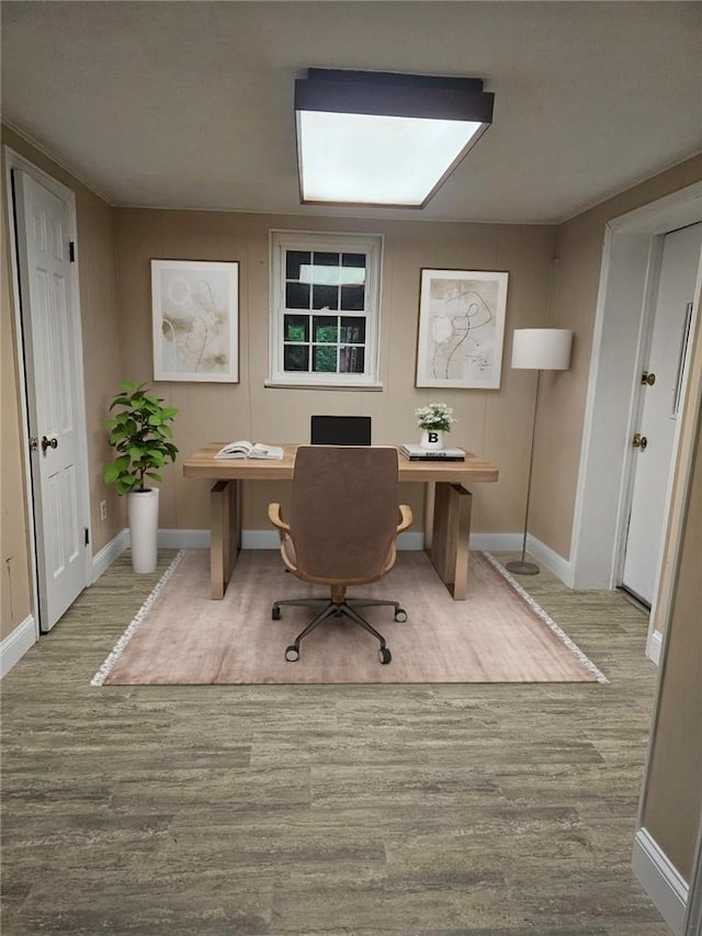 office area with light hardwood / wood-style flooring