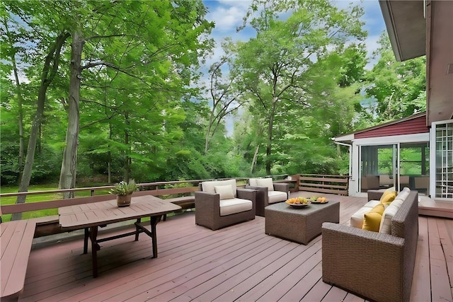 wooden deck featuring outdoor lounge area