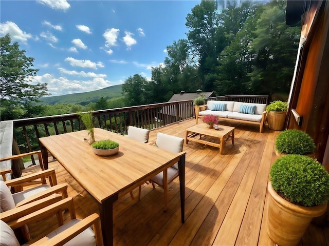 deck with an outdoor hangout area