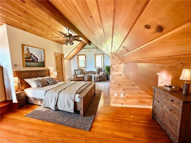 bedroom with hardwood / wood-style floors, wood ceiling, vaulted ceiling, and a wall unit AC