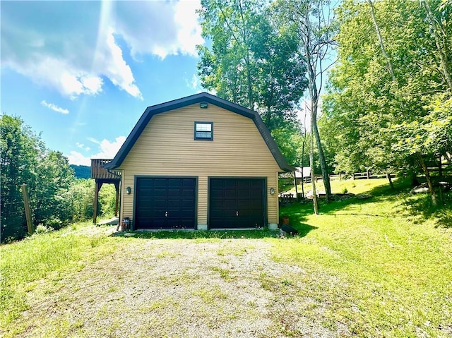 garage with a yard