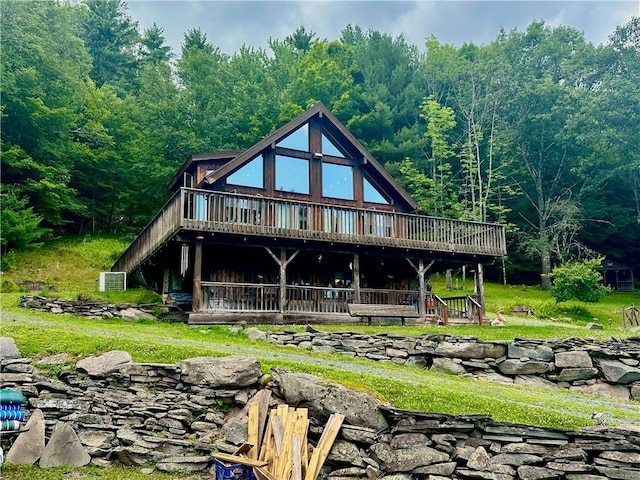 rear view of property with a deck