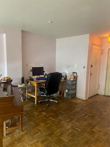 office area featuring dark parquet flooring