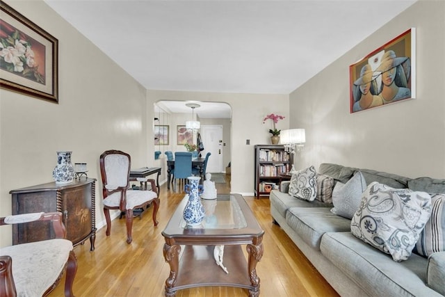 living room with light hardwood / wood-style flooring