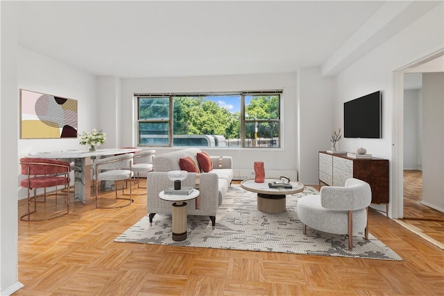 sitting room featuring light parquet flooring