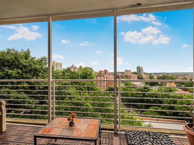 unfurnished sunroom with plenty of natural light