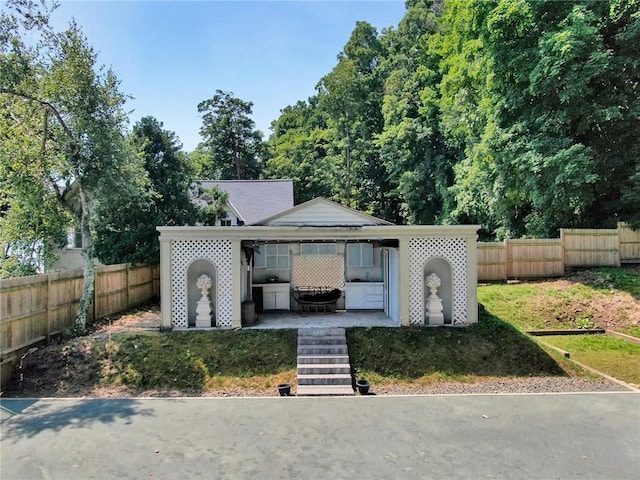 view of front facade featuring a patio area