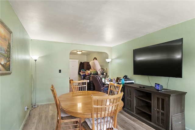 dining area with light hardwood / wood-style flooring