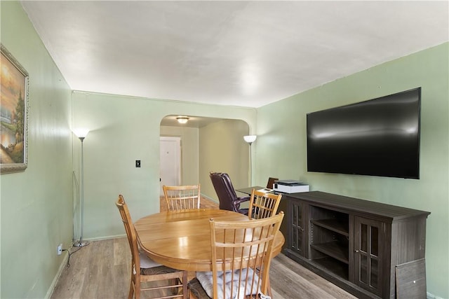 dining space featuring light hardwood / wood-style floors