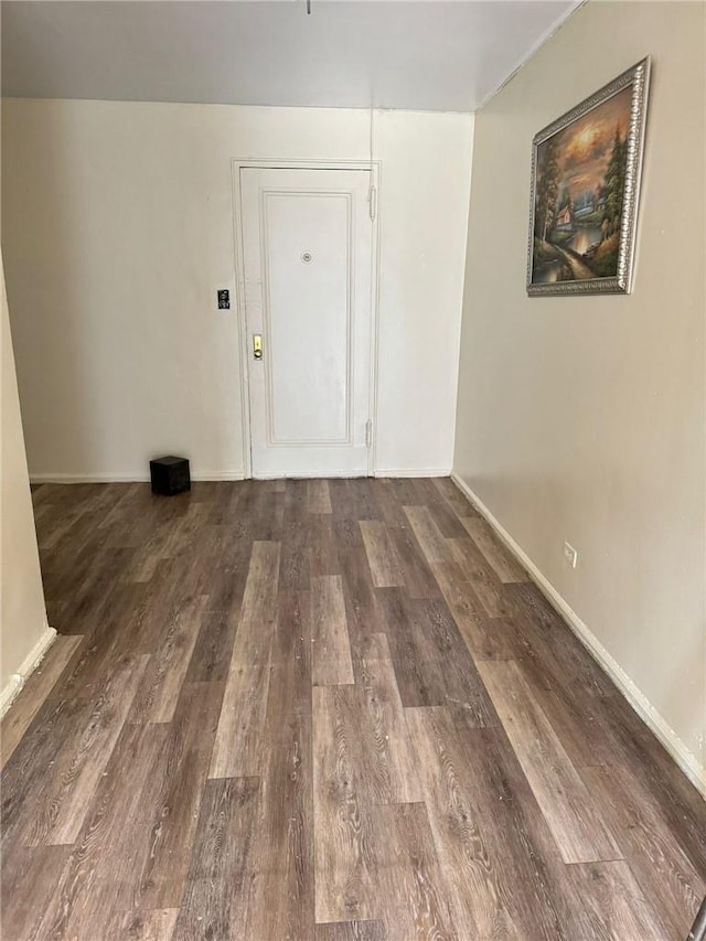 interior space with dark wood-type flooring