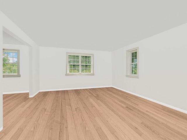 spare room featuring light wood-type flooring