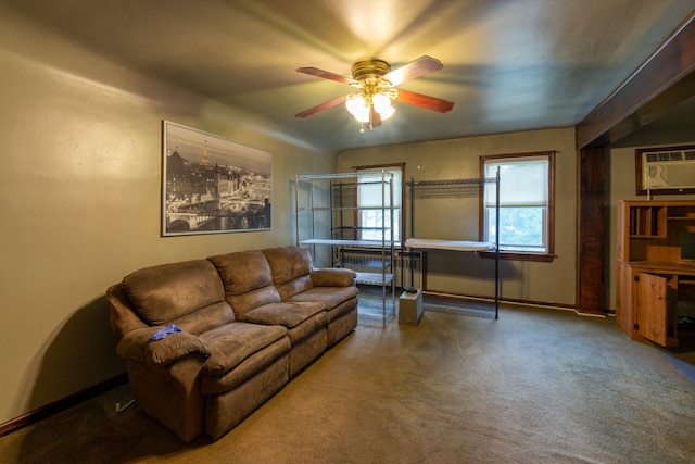 carpeted living room featuring ceiling fan