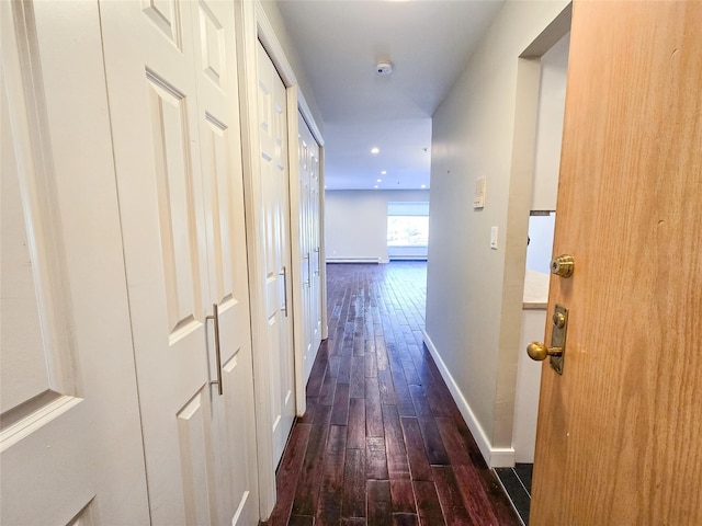 hall with dark hardwood / wood-style floors