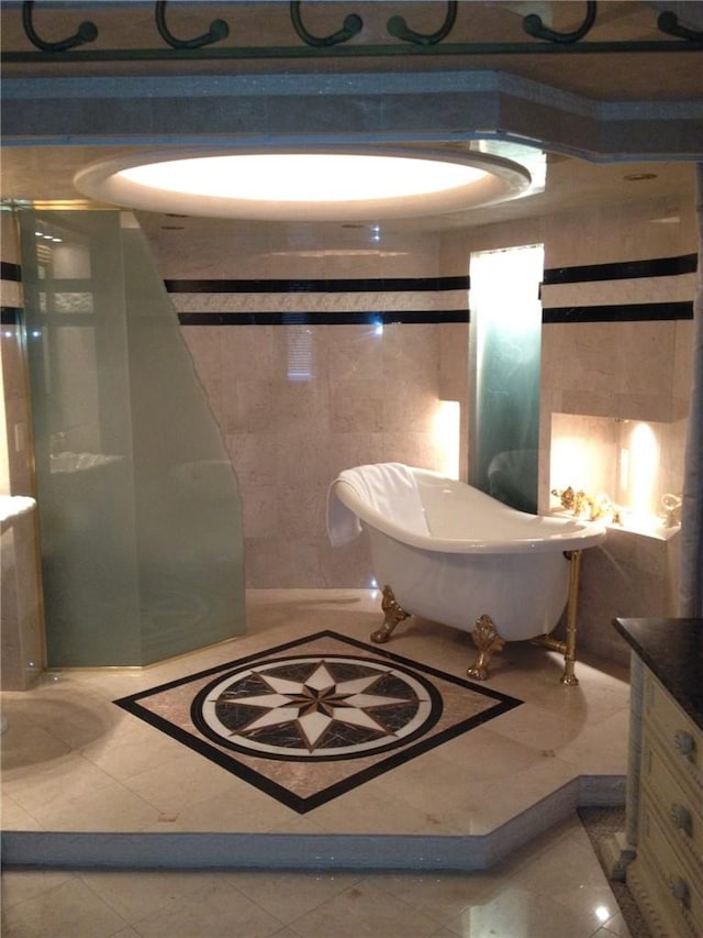 bathroom featuring a tub and tile patterned flooring