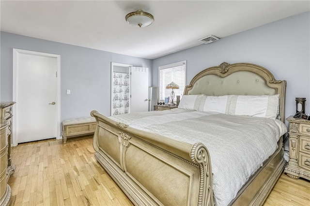 bedroom featuring light wood-type flooring