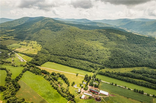 drone / aerial view with a mountain view and a rural view