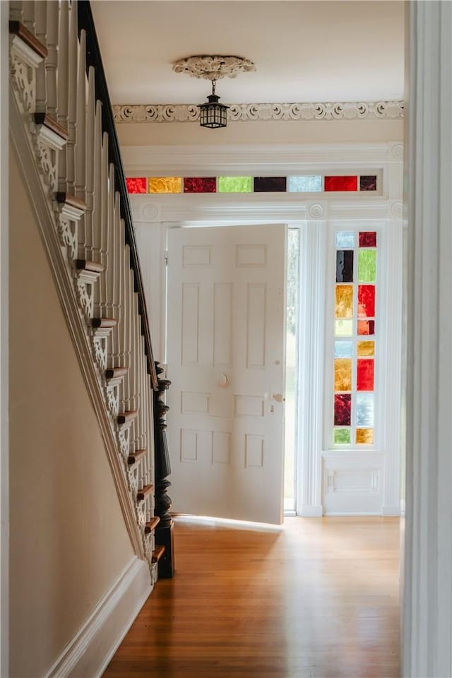 entrance foyer with hardwood / wood-style floors