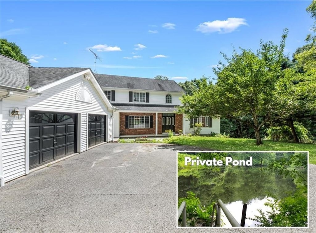 view of front of property with a garage