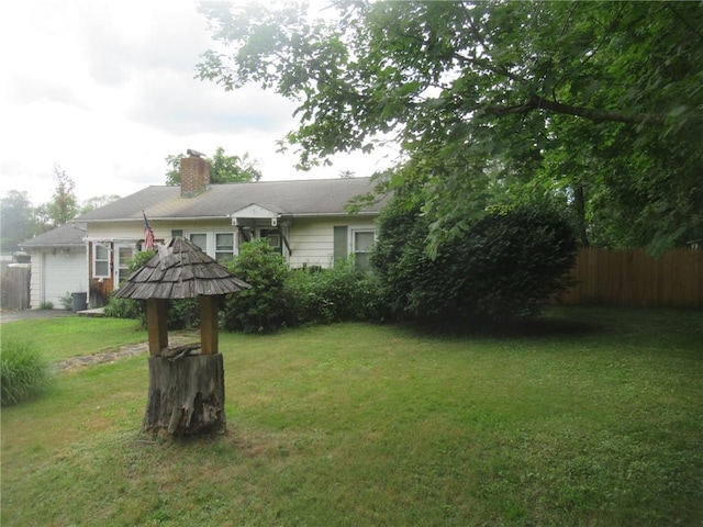 view of yard featuring a garage