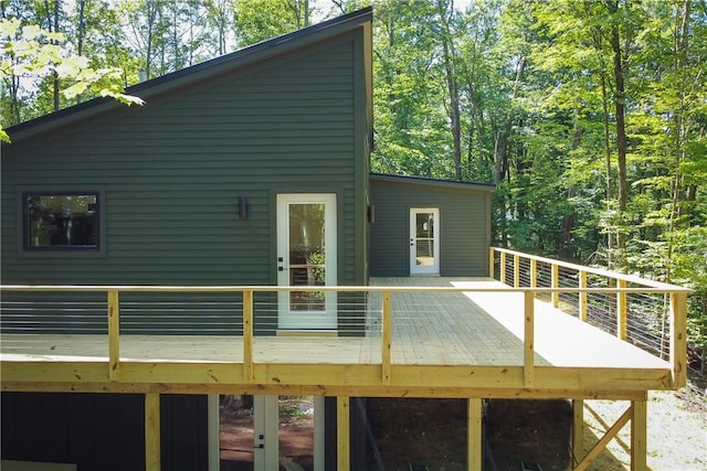 back of house featuring a deck