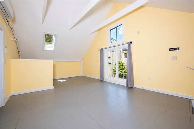 additional living space featuring beamed ceiling, an AC wall unit, high vaulted ceiling, and concrete floors