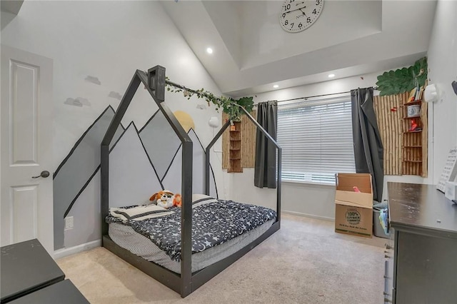 bedroom with light colored carpet and vaulted ceiling