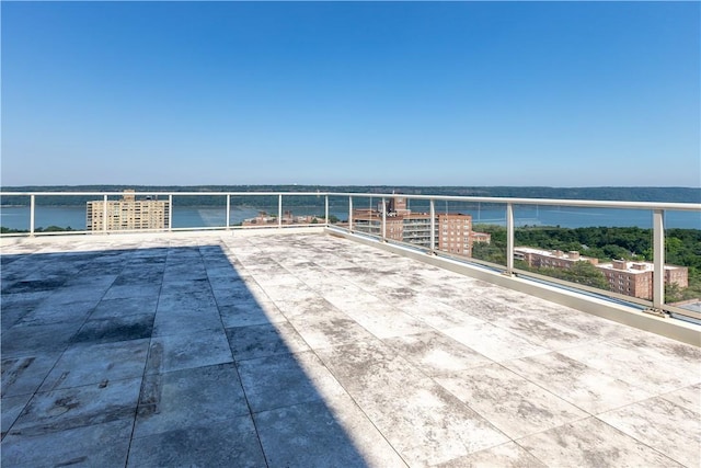 view of patio / terrace with a water view