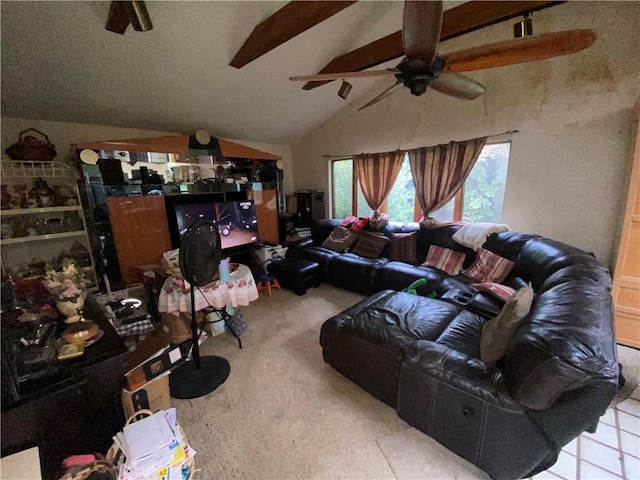 tiled living room with ceiling fan and lofted ceiling