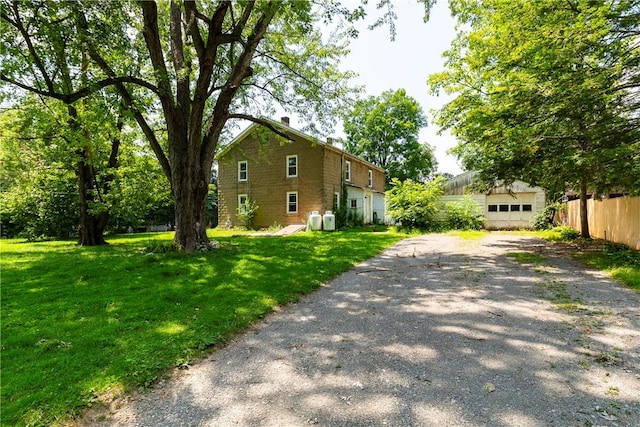 exterior space with a front lawn