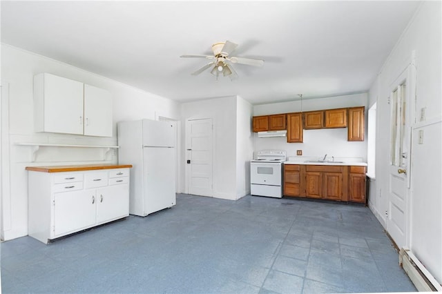 kitchen with baseboard heating, ceiling fan, sink, and white appliances