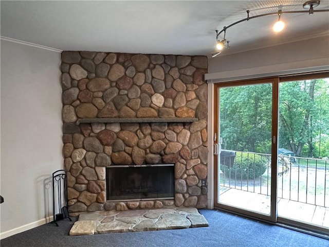 interior space featuring a fireplace, carpet floors, and ornamental molding