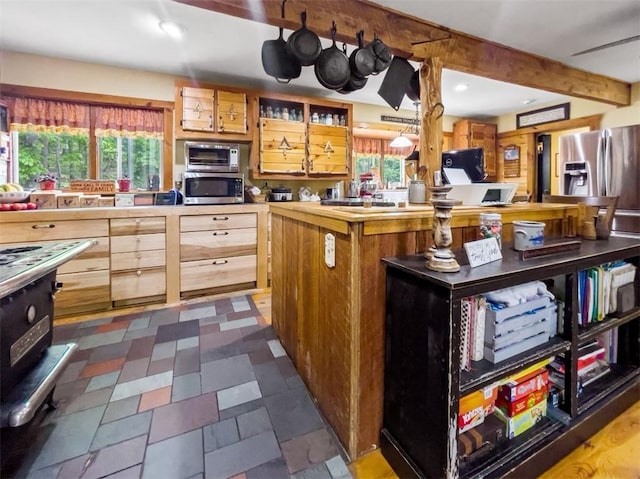 kitchen with plenty of natural light and a center island