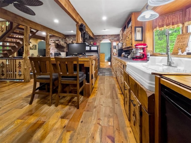 kitchen with light hardwood / wood-style floors and sink