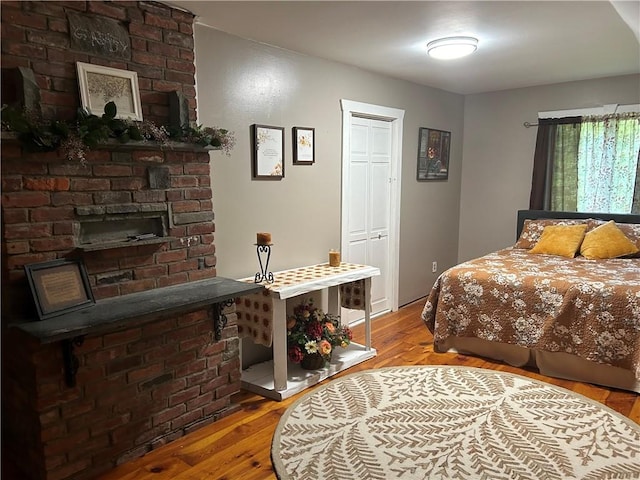 bedroom featuring a closet and wood-type flooring