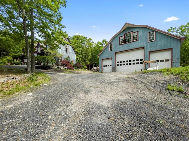 view of property exterior featuring a garage