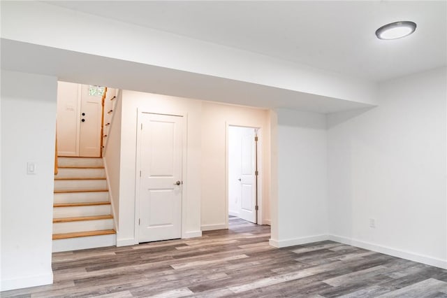 basement featuring hardwood / wood-style flooring