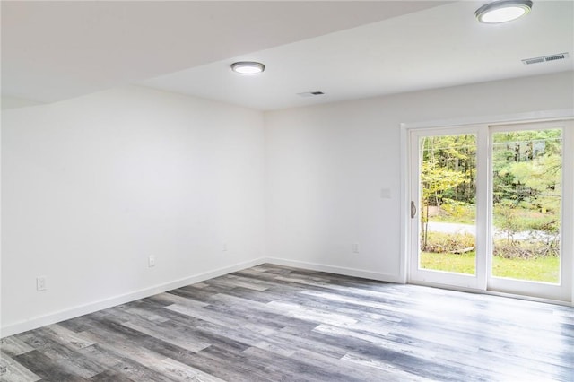 empty room featuring hardwood / wood-style floors