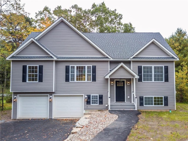 split foyer home featuring a garage