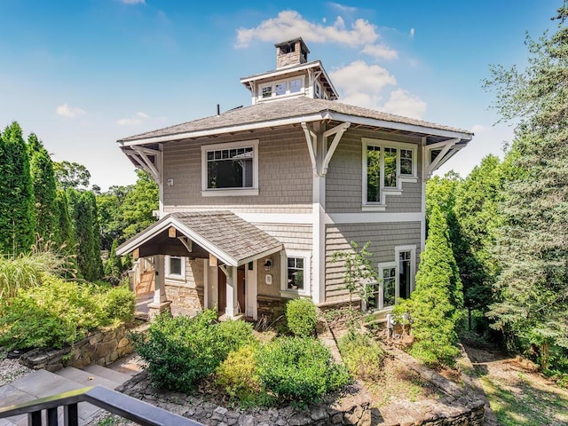 33 Truesdale Lake Dr, South Salem, NY 10590 - view of front of property featuring a chimney, roof with shingles, and stone siding