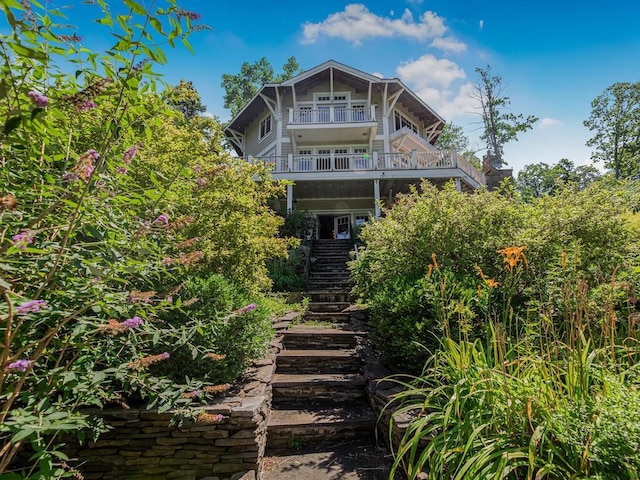 33 Truesdale Lake Dr, South Salem, NY 10590 - rear view of property featuring stairway and a balcony