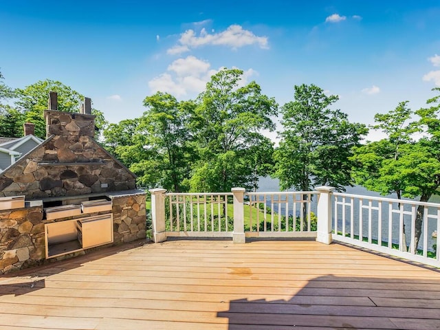 wooden deck with exterior kitchen