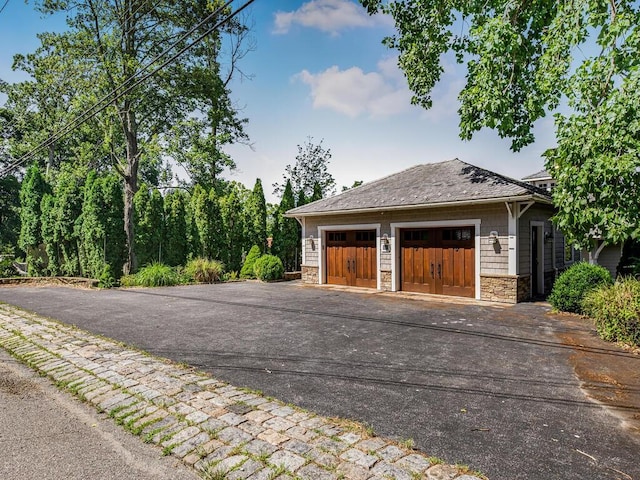 33 Truesdale Lake Dr, South Salem, NY 10590 - garage with asphalt driveway
