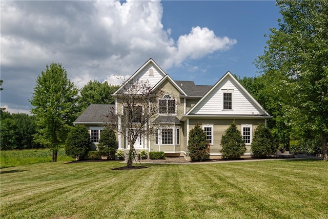 view of front of home with a front yard